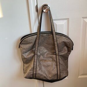 Gold Victoria’s Secret overnight bag